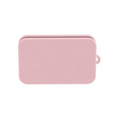 Pink silicone phone holder for compatible EVA beach totes, shown on a white background
