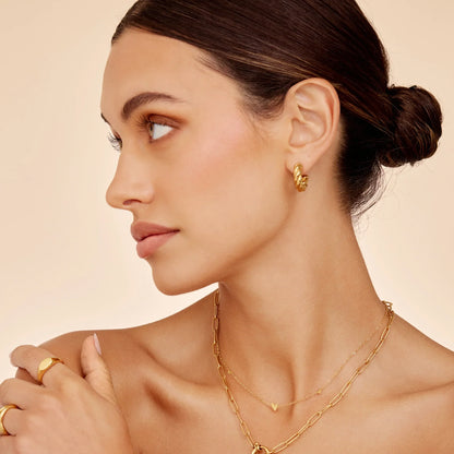 Gold twist earrings close-up detail — Olivia Jewelry