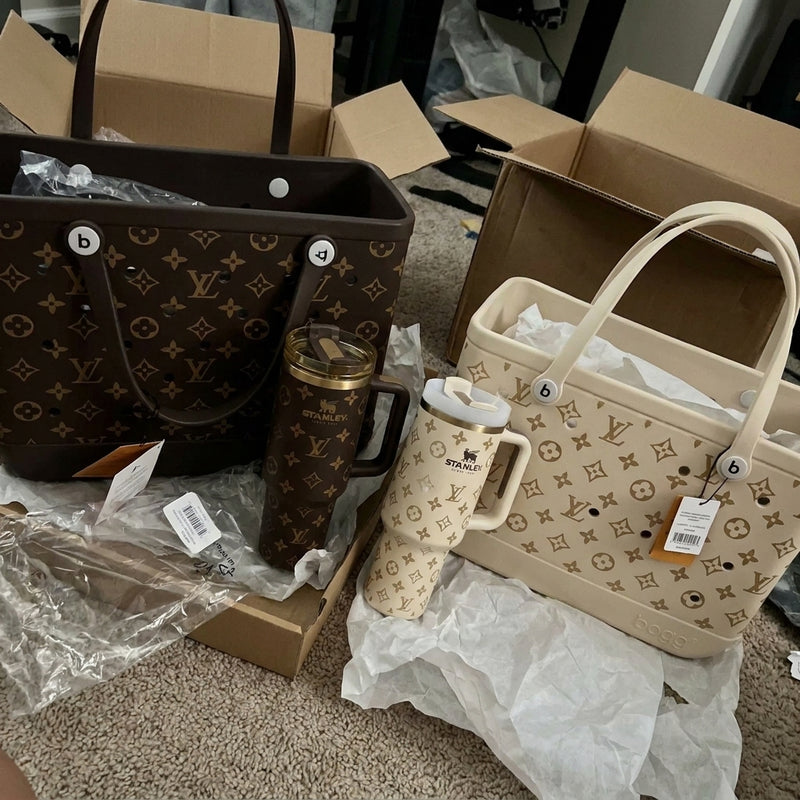 Brown and cream matching tote and tumbler sets on a carpet