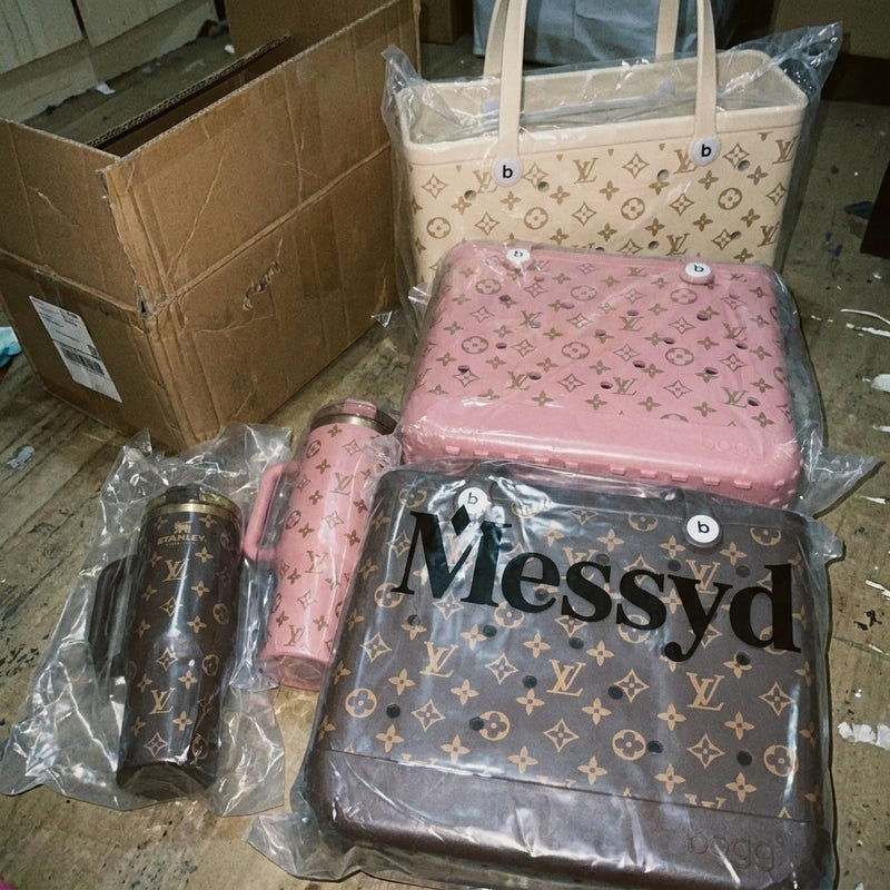 Cream, pink, and brown totes with matching tumblers on the floor