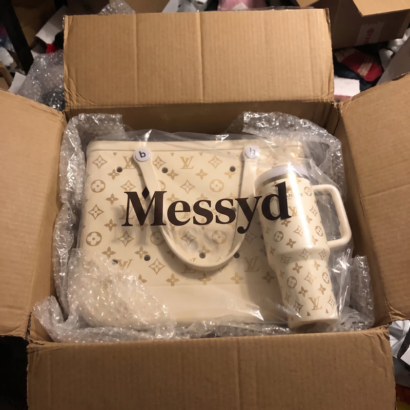 Overhead view of a cream Messyd set in a shipping box
